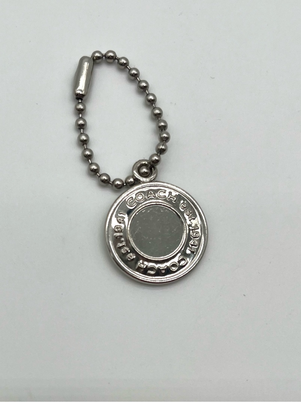 COACH Medallion Round Metal Hang Tag, Silver Bag Charm